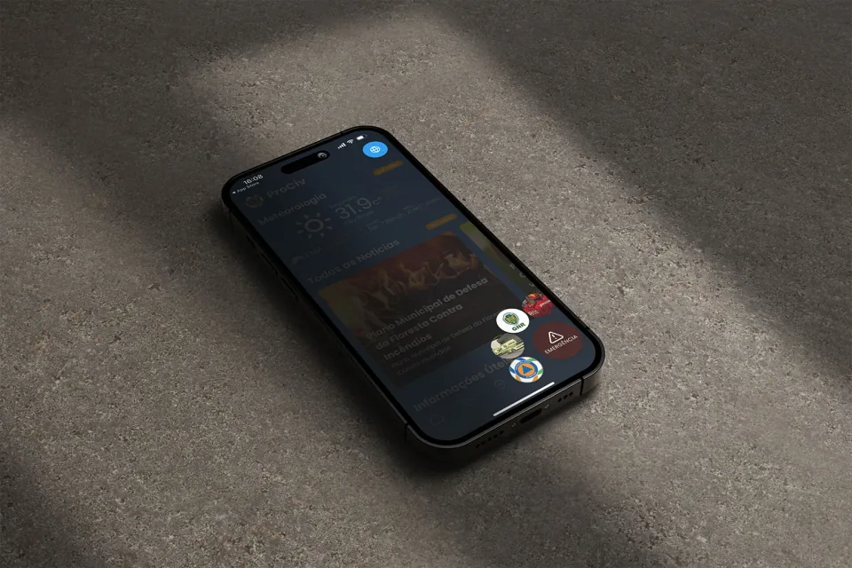 iPhone pousado com a app aberta e os atalhos de emergência visíveis.